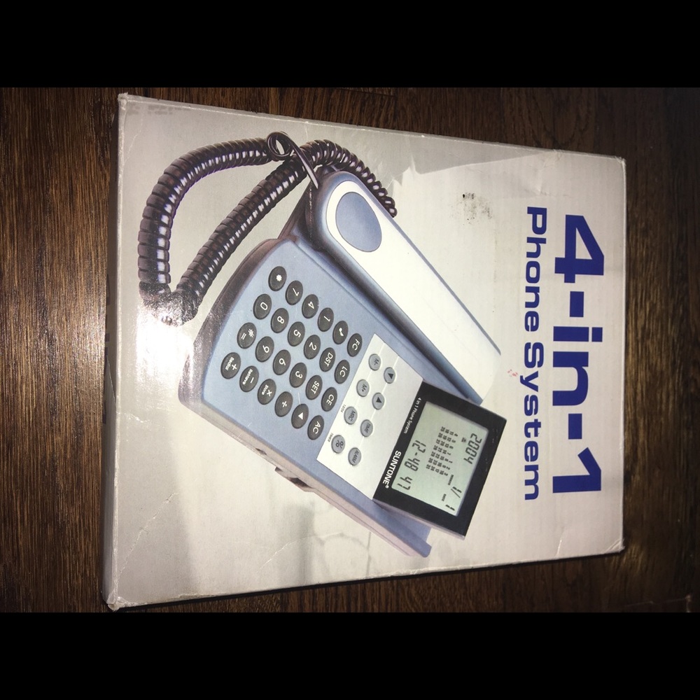 Suntone 4-in-1 telephone with date and calculator